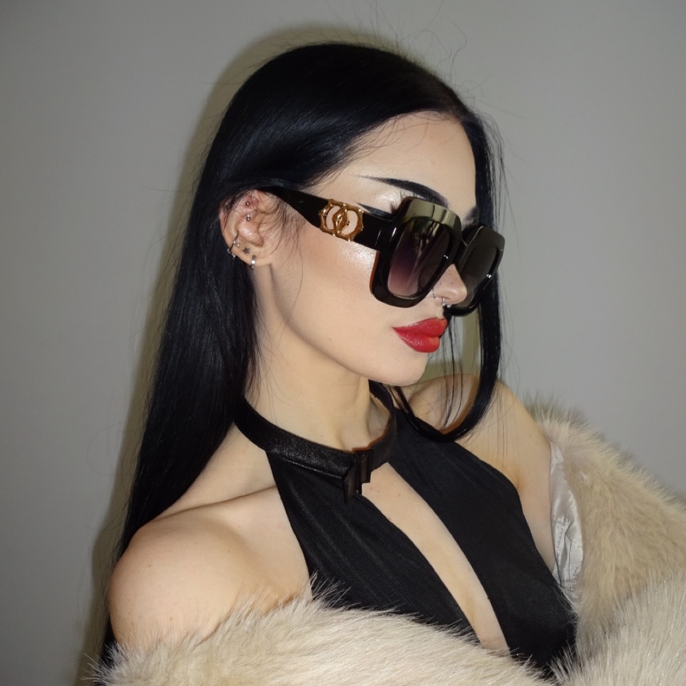 Women's Oversized Black Sunglasses with Gold Emblem Accent
